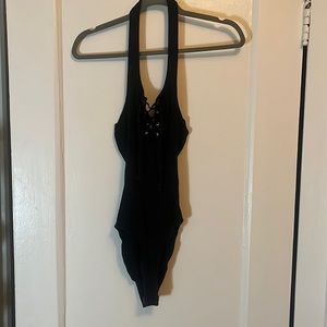 Black halter bodysuit with crisscross detail